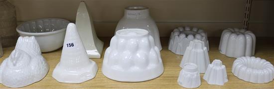 Twelve porcelain jelly moulds